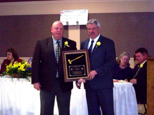 President Montgomery presented the President's Award to Vice President Colonna.